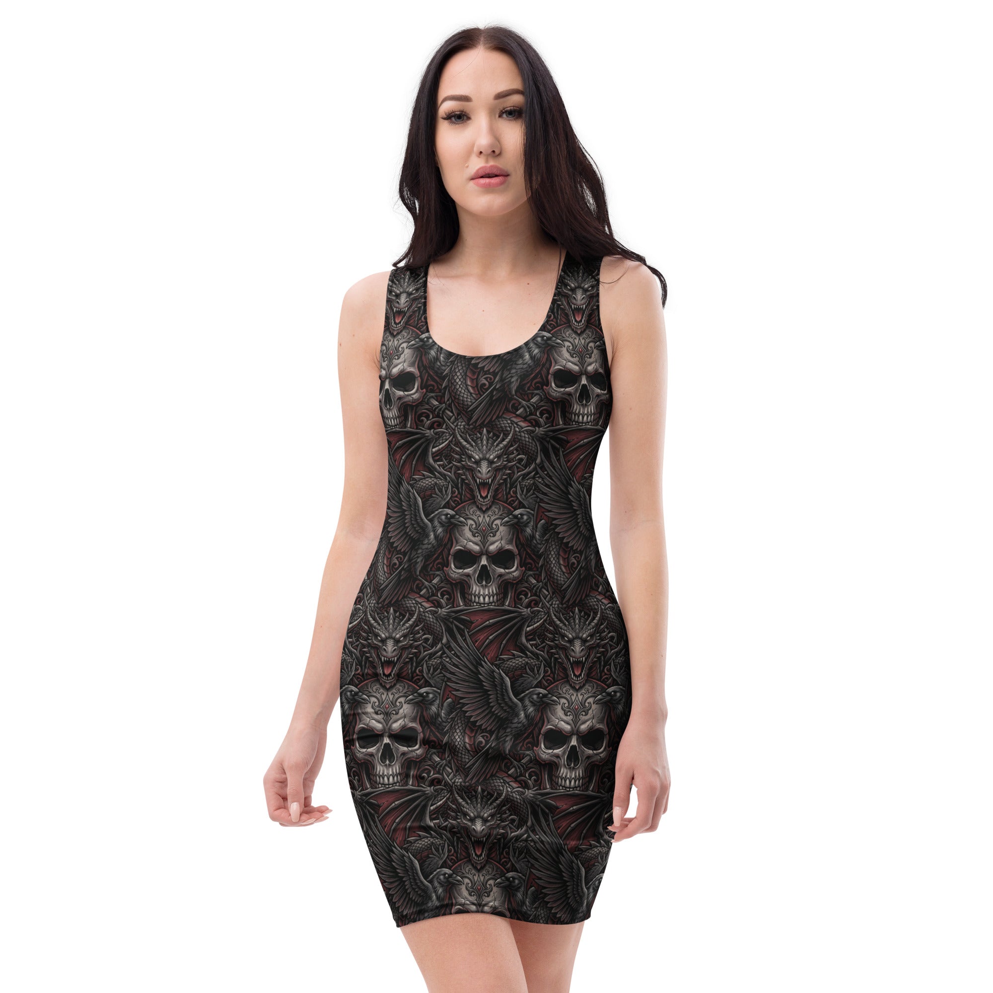 A woman modeling a sleeveless bodycon mini dress with an all-over gothic skull and bat pattern on a black background, set against a plain white studio backdrop.