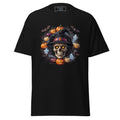 A black short-sleeve crewneck t-shirt featuring a large graphic print of a skull wearing a witch hat, surrounded by pumpkins, bats, and ghosts, shown against a plain white background.